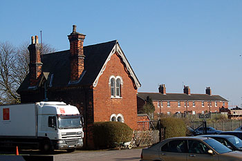 The former railway station with Railway Cottages beyond March 2011
